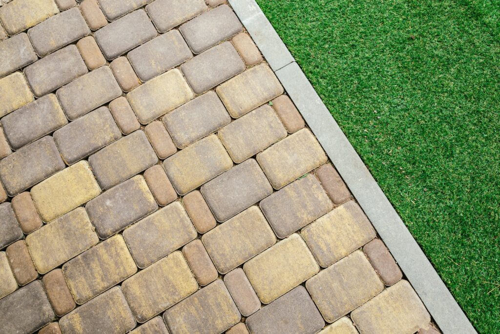 green grass and brick background